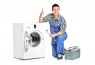 Repairman giving thumb up next to a washing machine